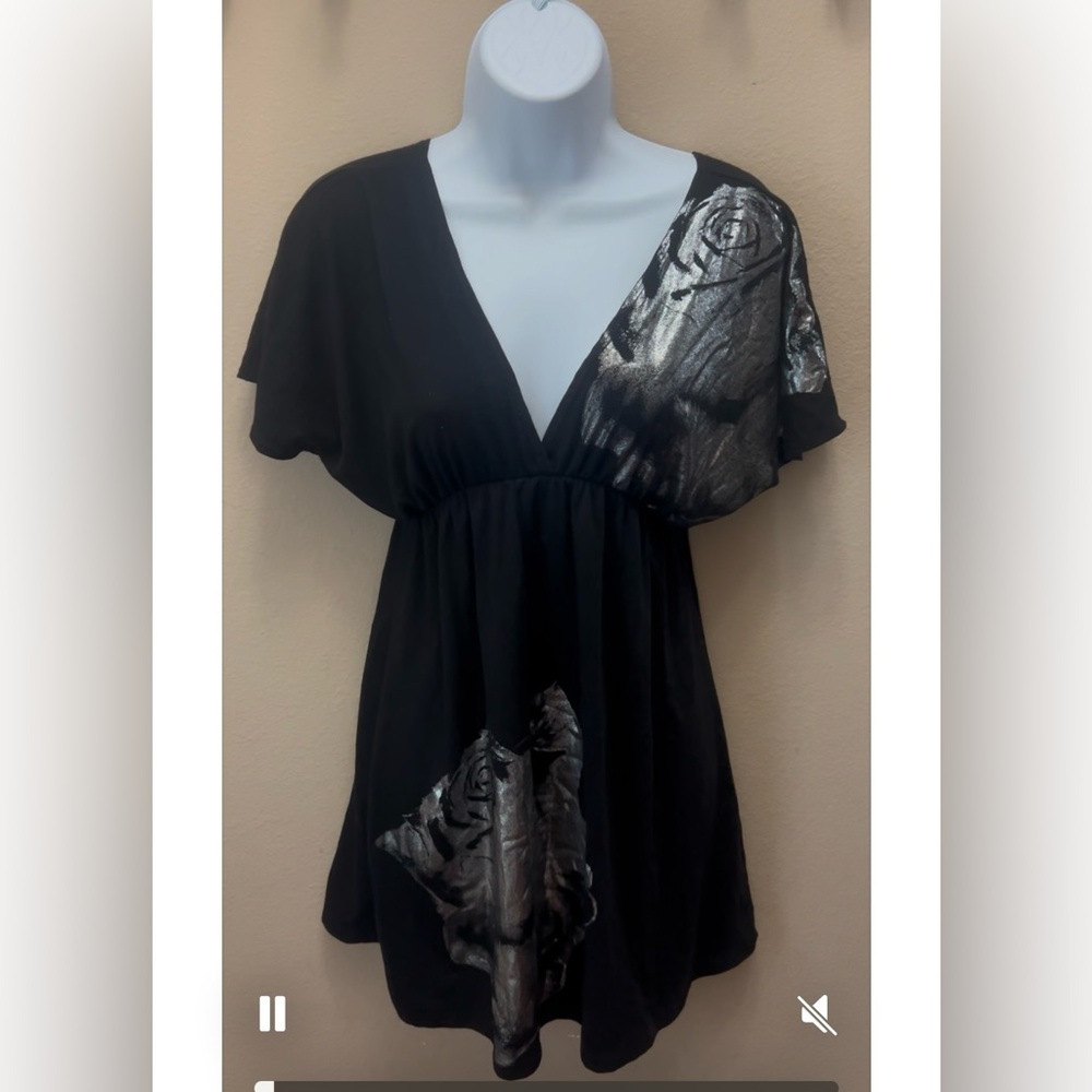 A black and silver top size medium.